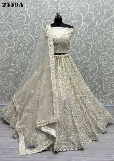 D.NO. 2559A TO 2559D BY ANJANI ART HEAVY NET LEHENGA CHOLI WHOLESALER IN INDIA